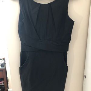 Black fitted dress with pockets